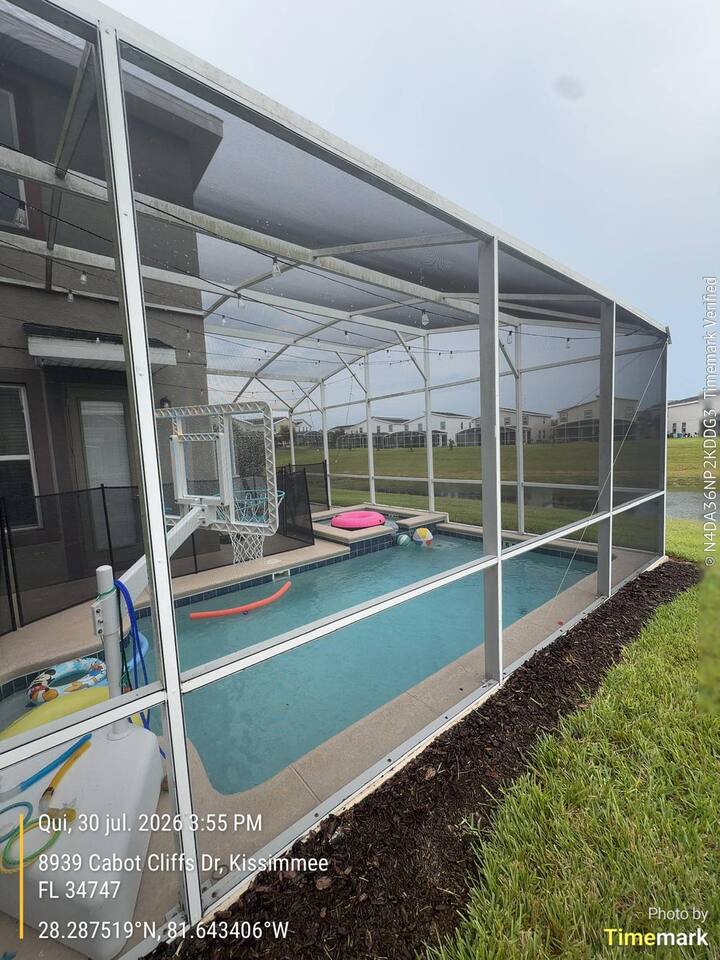 Pool enclosure screen in Kissimmee after repair